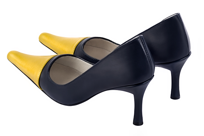 Yellow and navy blue women's dress pumps,with a square neckline. Pointed toe. High slim heel. Rear view - Florence KOOIJMAN